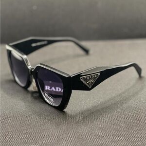 These are Prada designer sunglasses for women in excellent condition